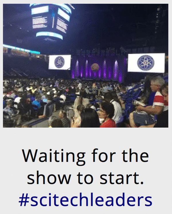 Tweet showing the Summit auditorium before showtime: Waiting for the show to start. #scitechleaders